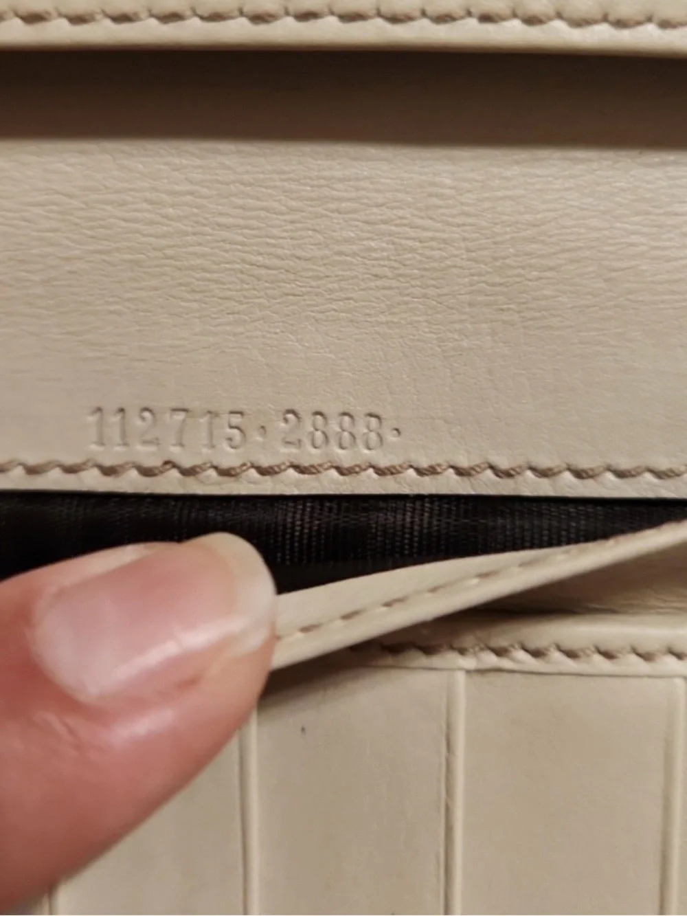 Gucci wallet embossed